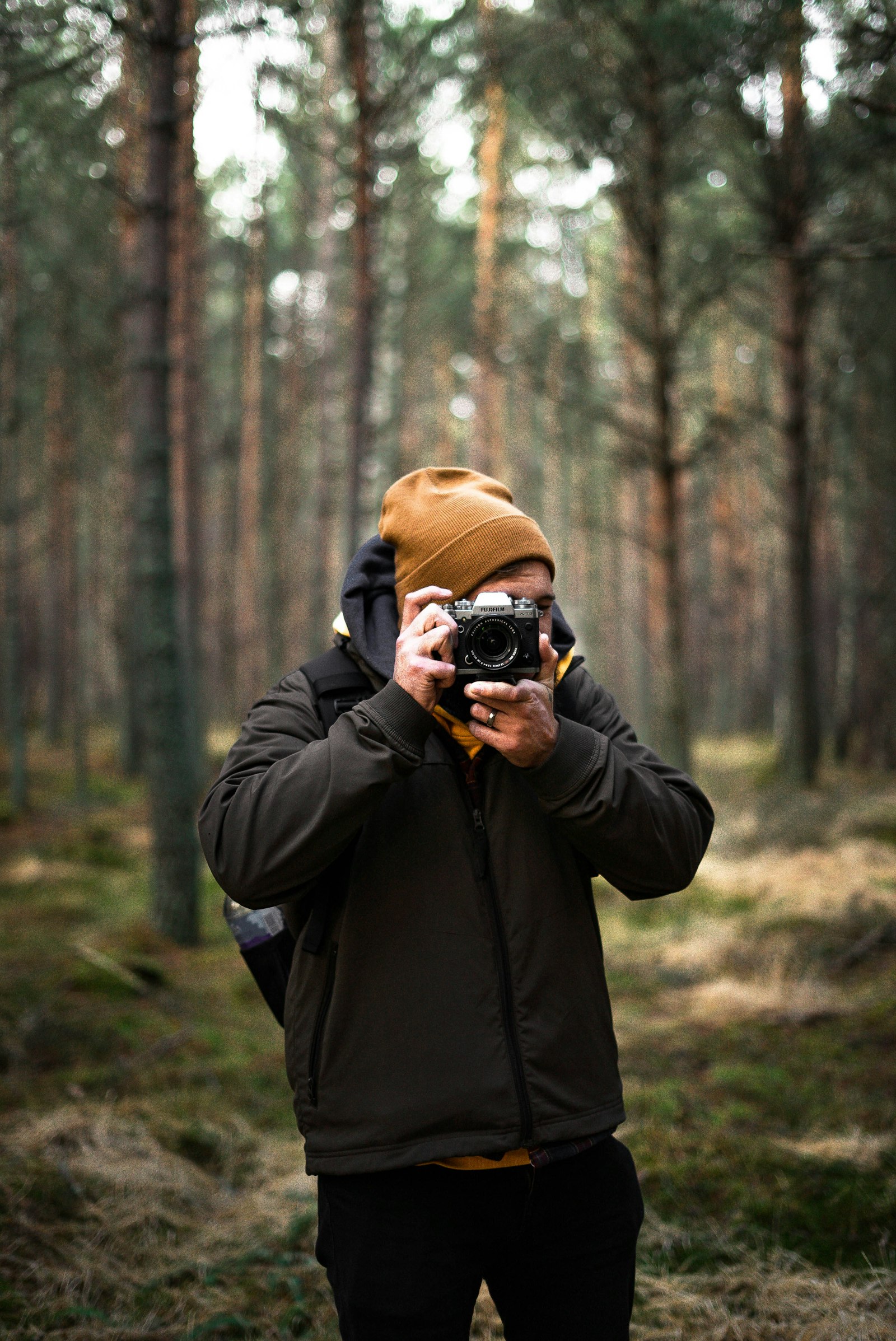 Sony a7S II + Sony FE 50mm F1.8 sample photo. Man taking photo photography