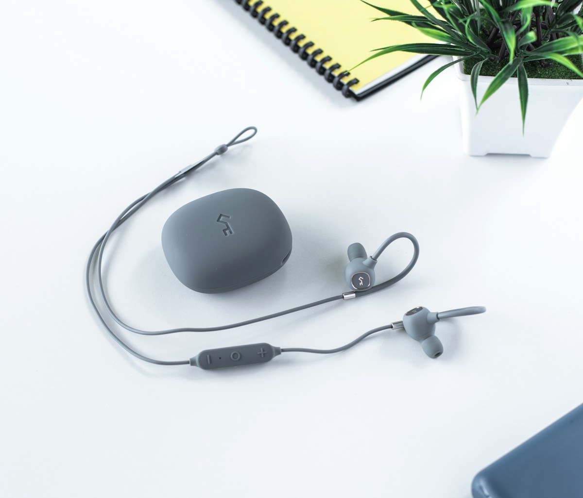 Grey Bluetooth earbuds