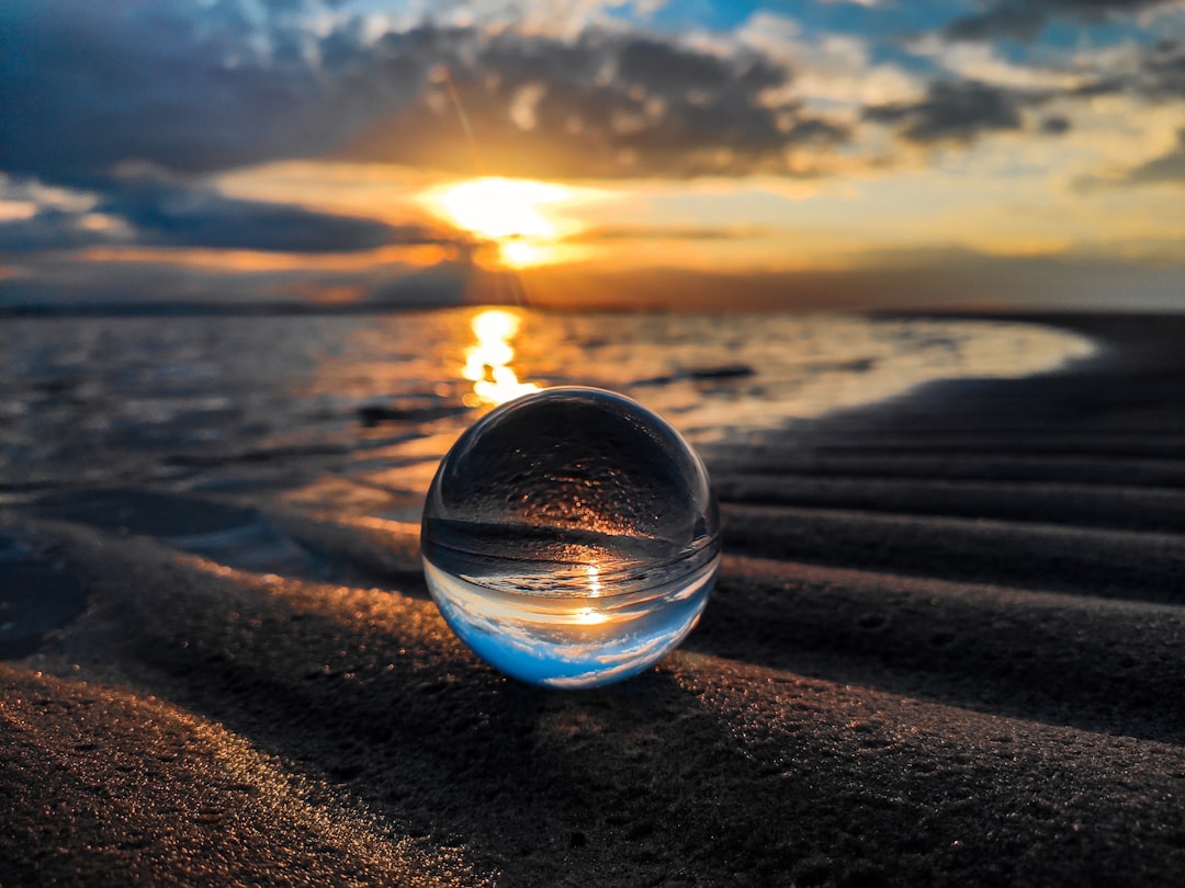 ocean photography, Lensball in Sand at the Baltic Sea at Sunset