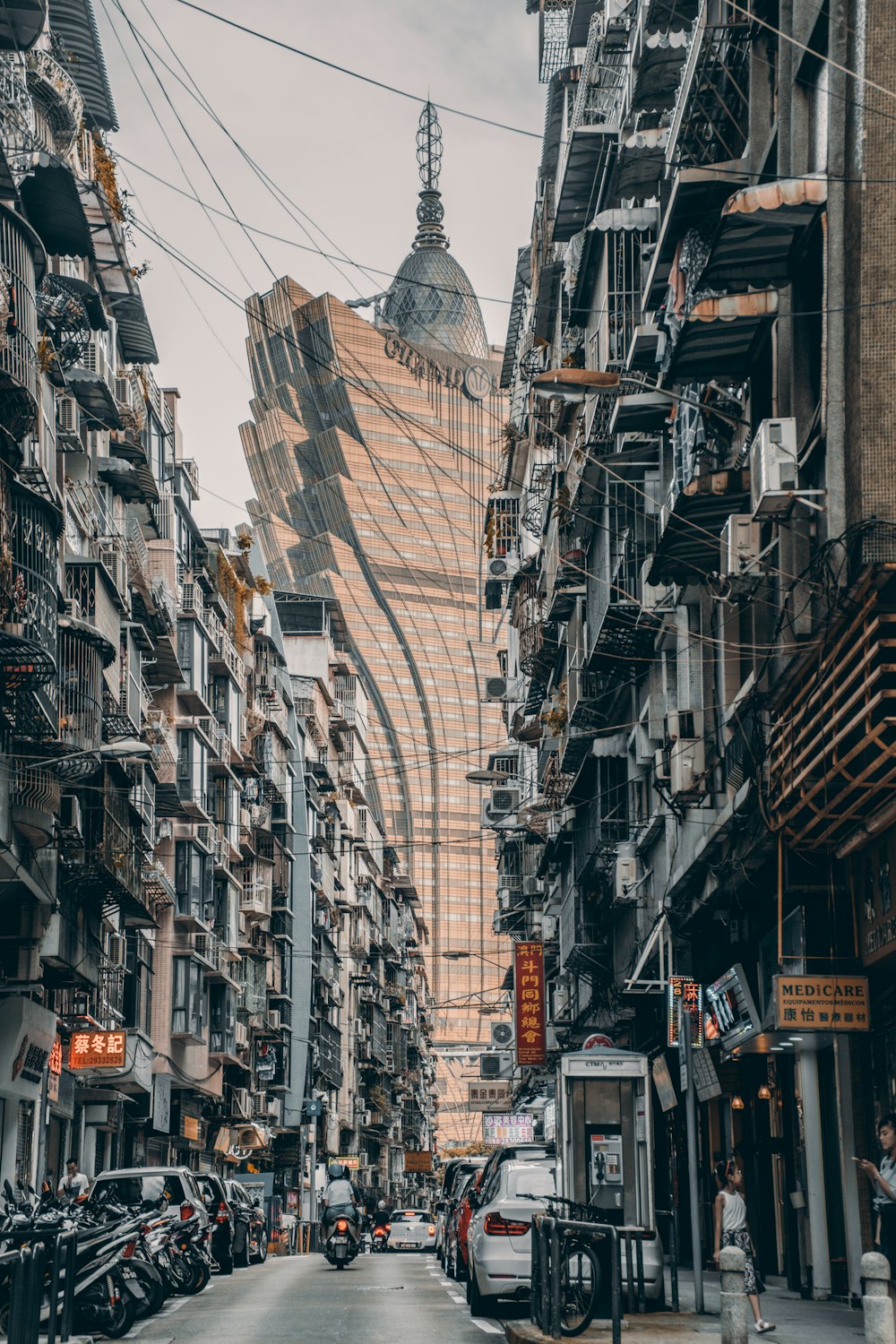 parked cars between buildings