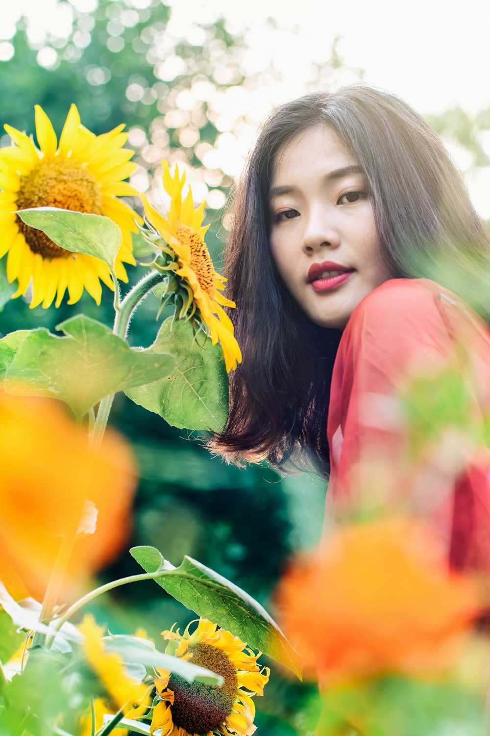 women's red lipstick close-up photography