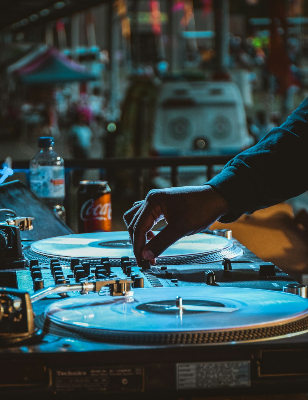 person playing turntable