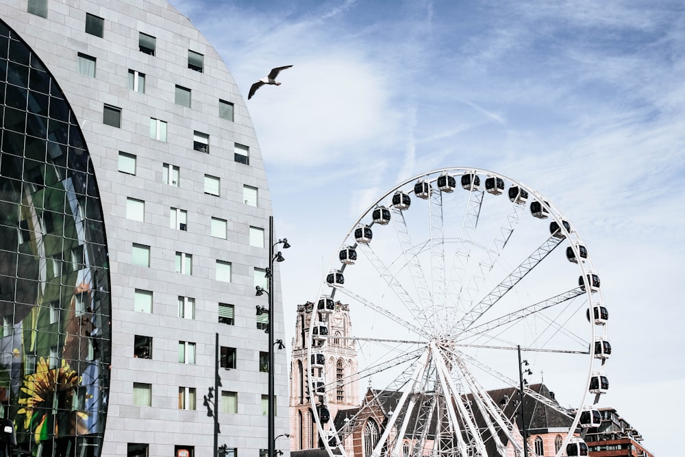 white fairy's wheel near building during daytime