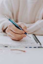 blue and black click pen