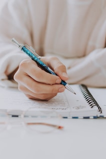 blue and black click pen