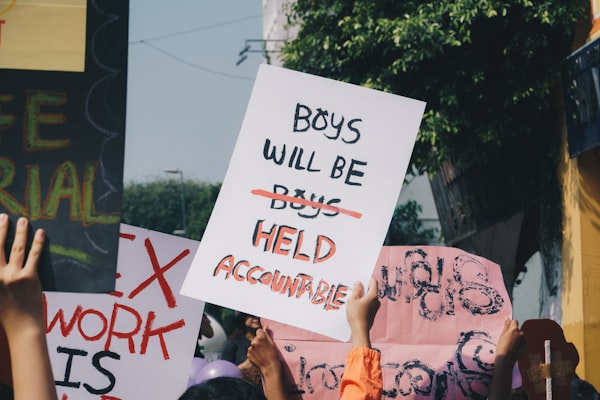 Boys Will Be Held Accountable protest sign