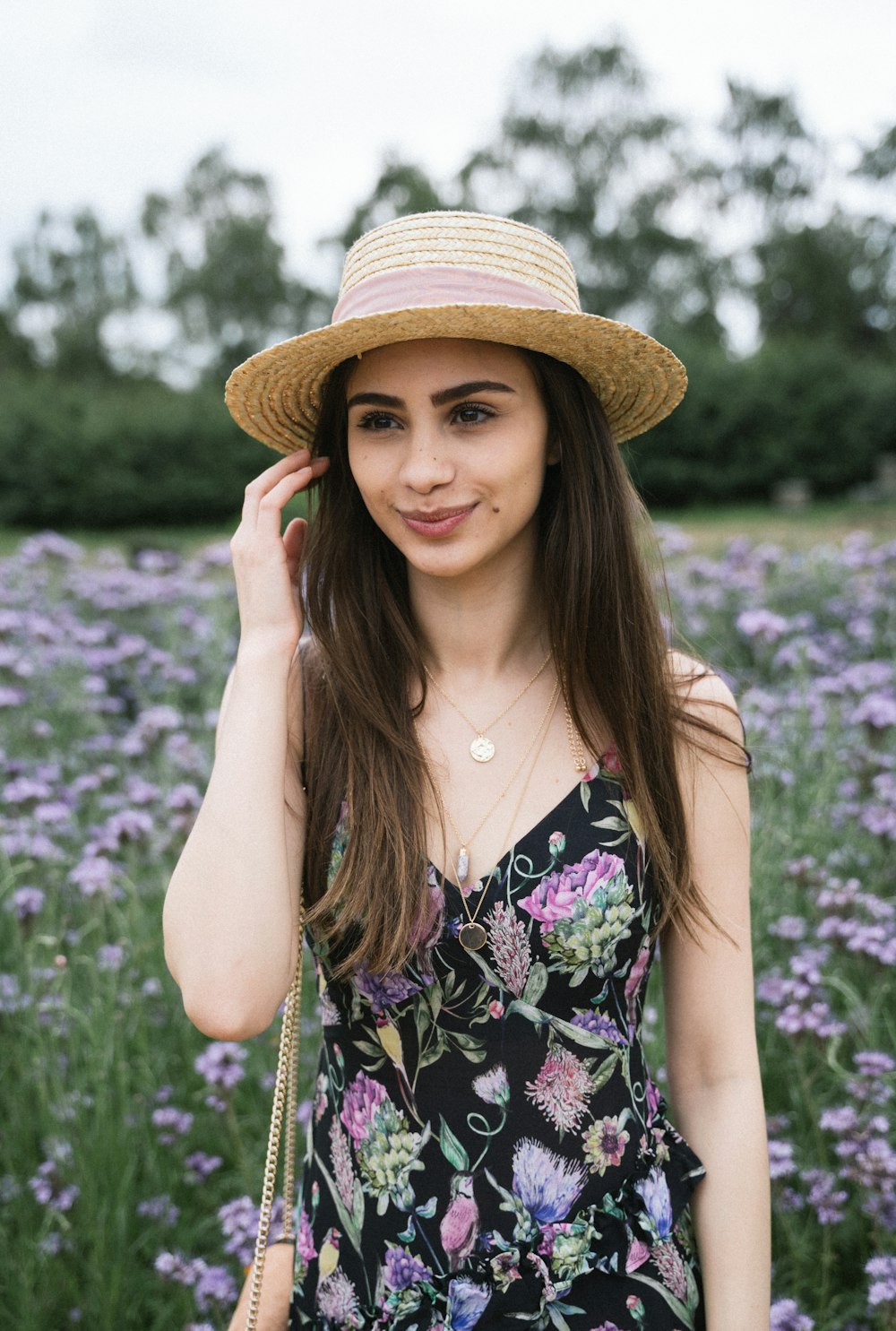 woman holding cheek