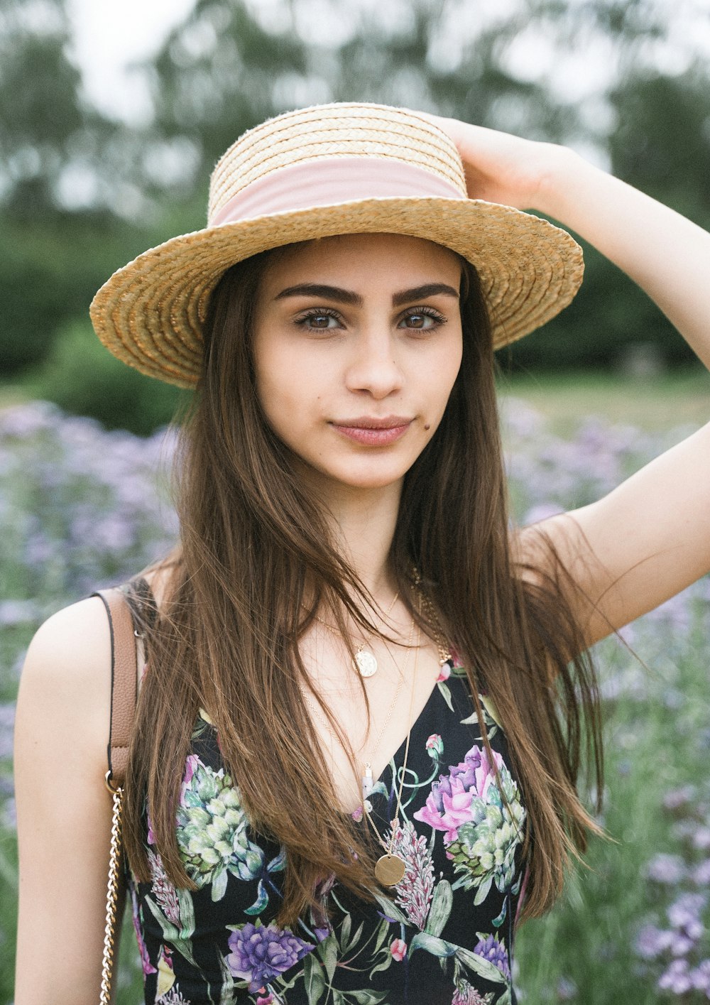 woman wearing beige strawhat