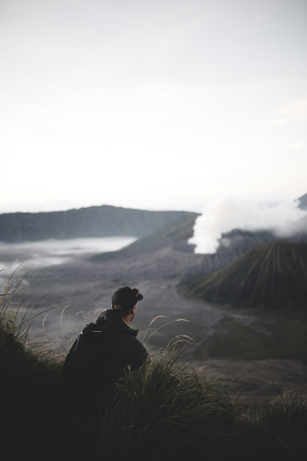 men sits on hill