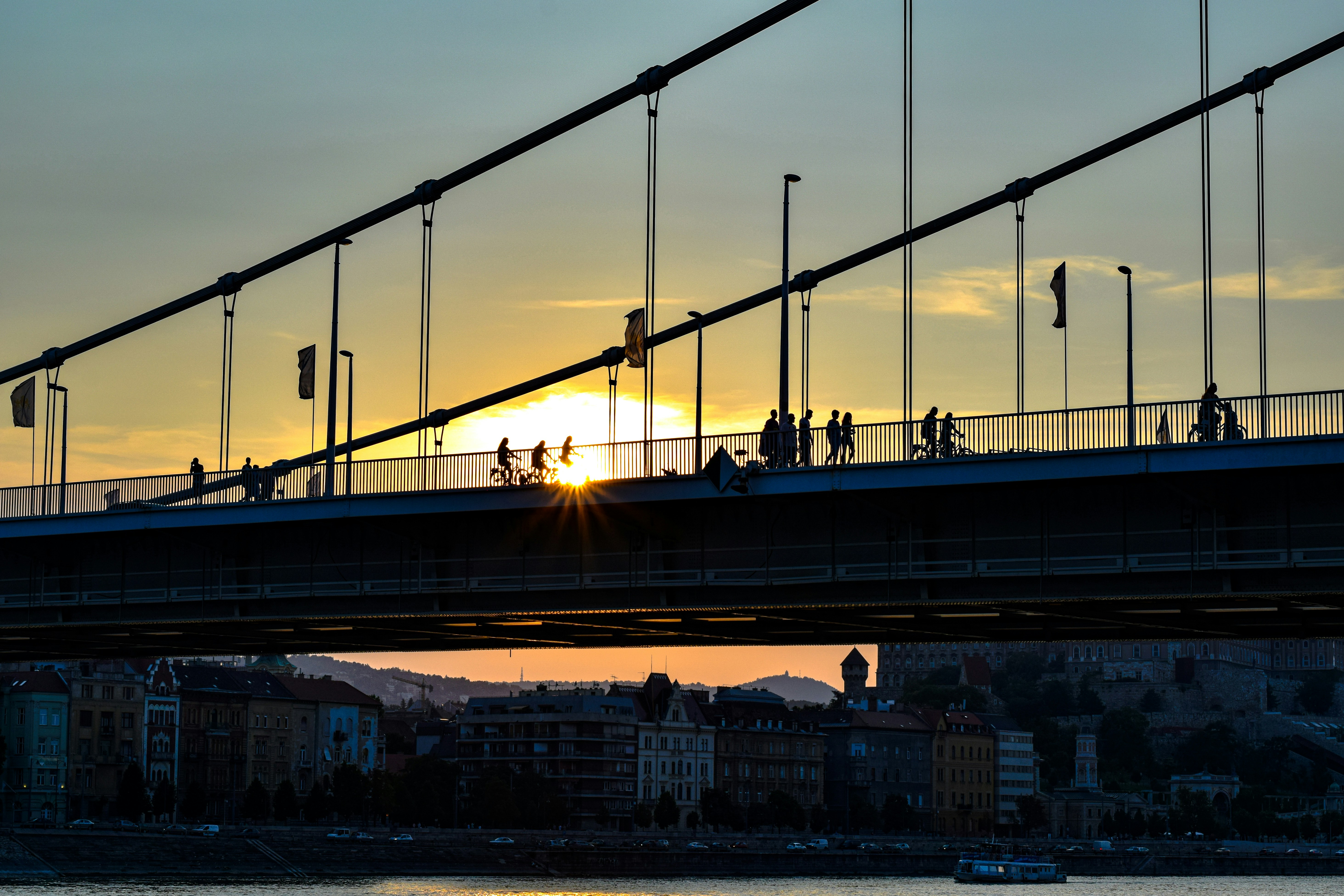 people walking on bridge