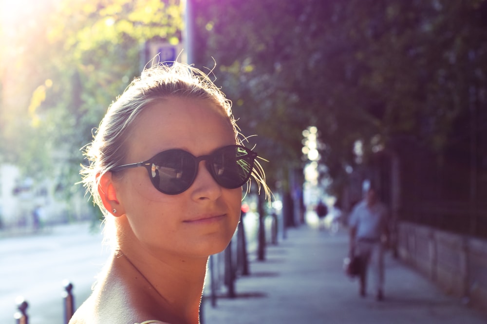 smiling woman taking selfie