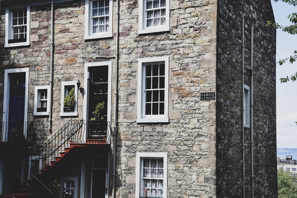 beige concrete 3-storey house