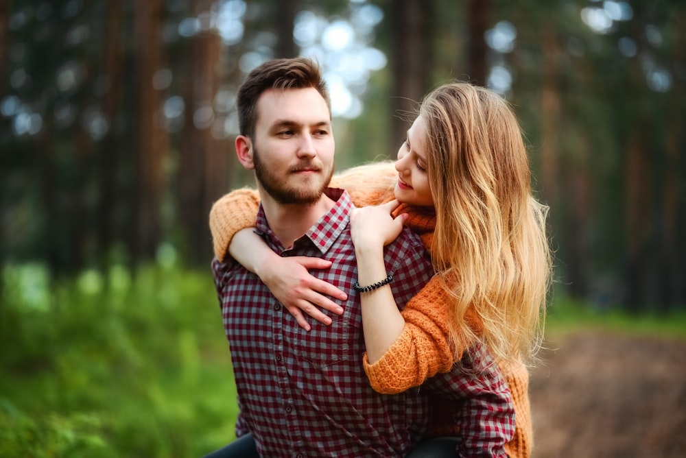 woman on man's back