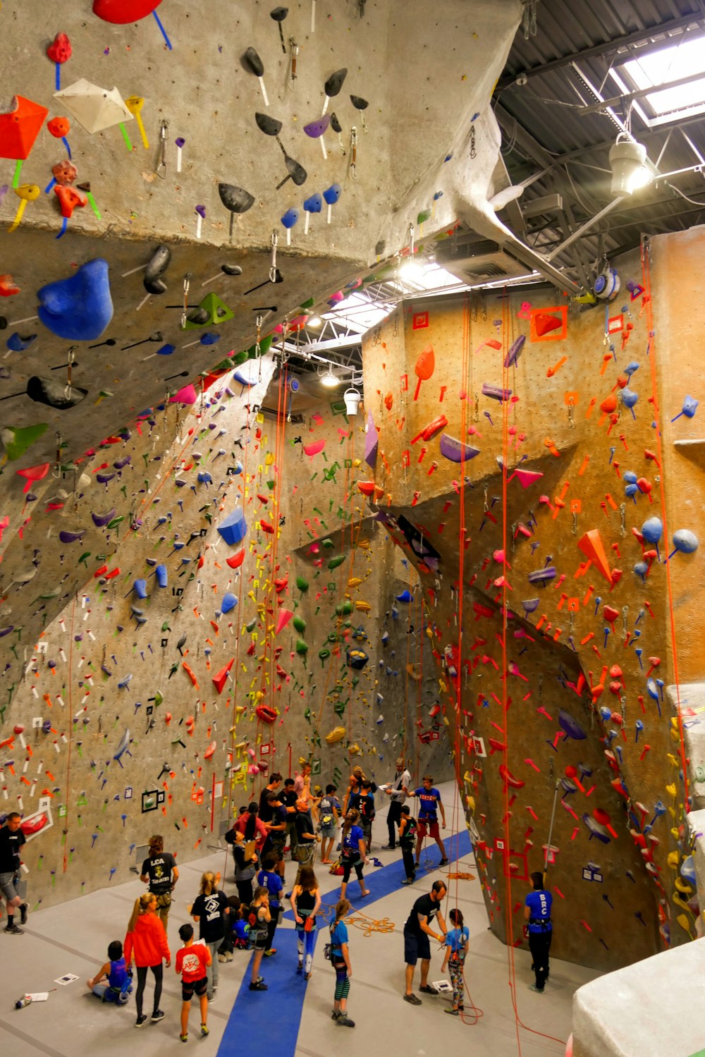 people in rock climbing room