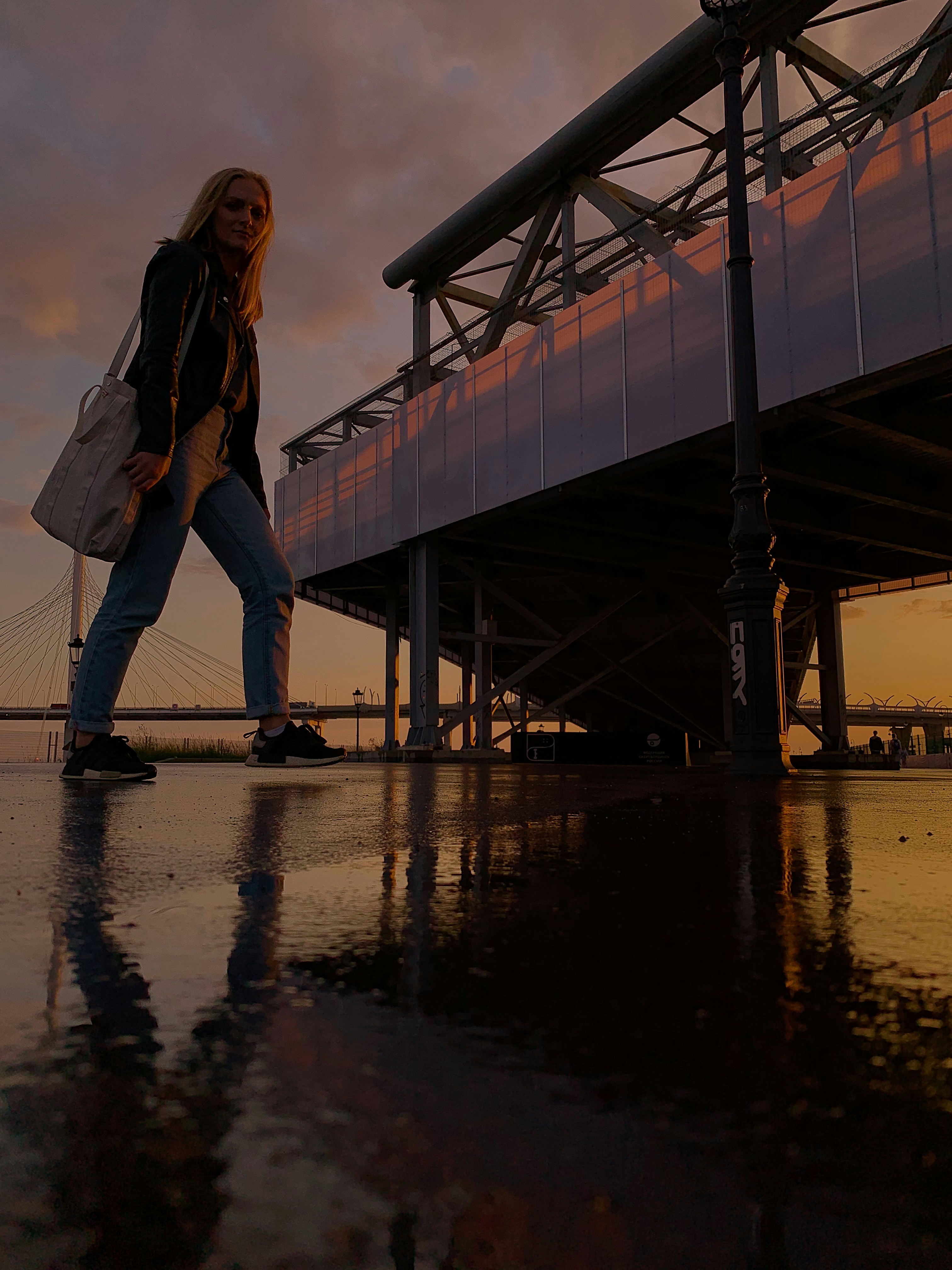 woman walking near building
