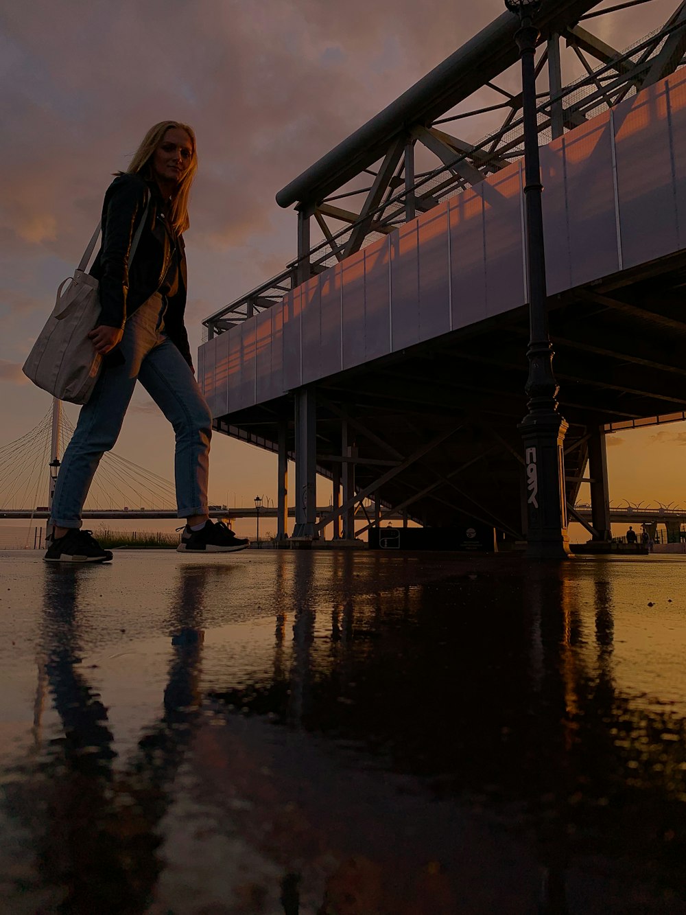 woman walking near building