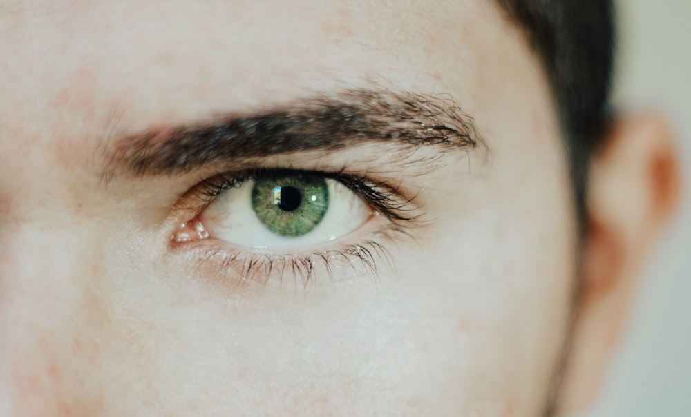 Boy with gold eye photo – Free Human Image on Unsplash