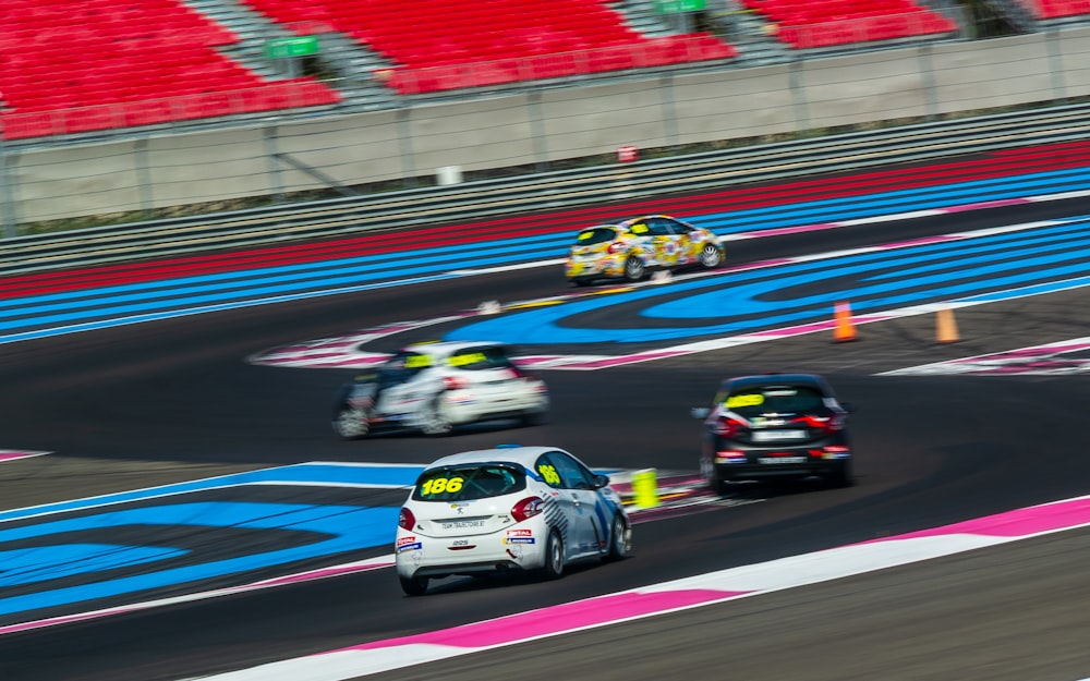 shallow focus photography of white car on road