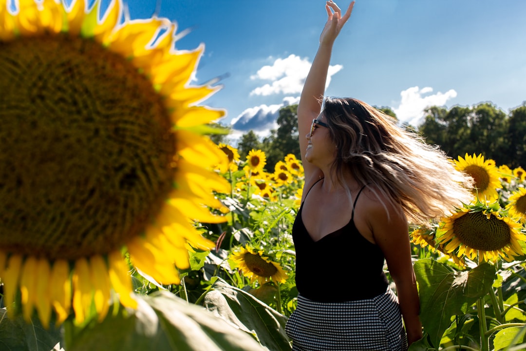 woman raising right hand