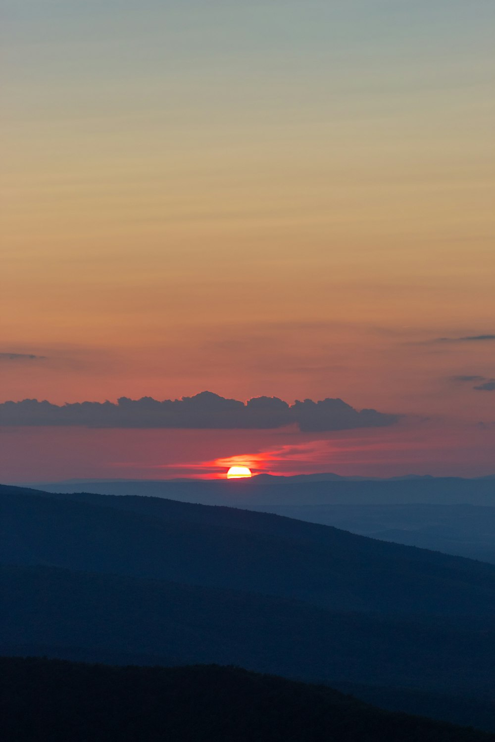 silhouette mountain during sunset