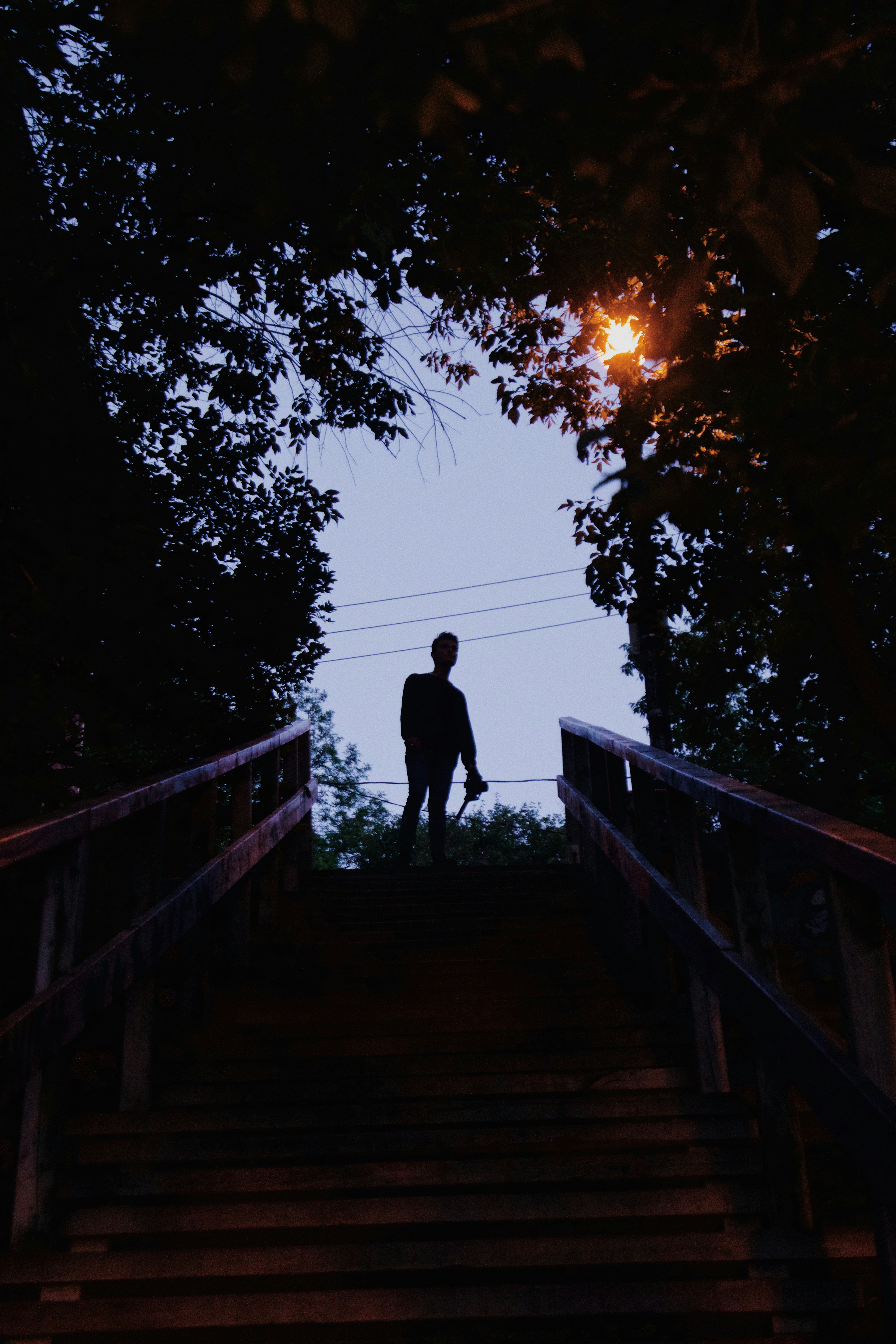 silhouette of person standing near stars during daytime