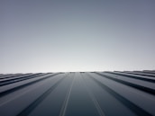 Finished roof with clean lines and a fresh look on a sunny day.