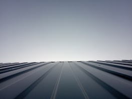 Finished roof with clean lines and a fresh look on a sunny day.