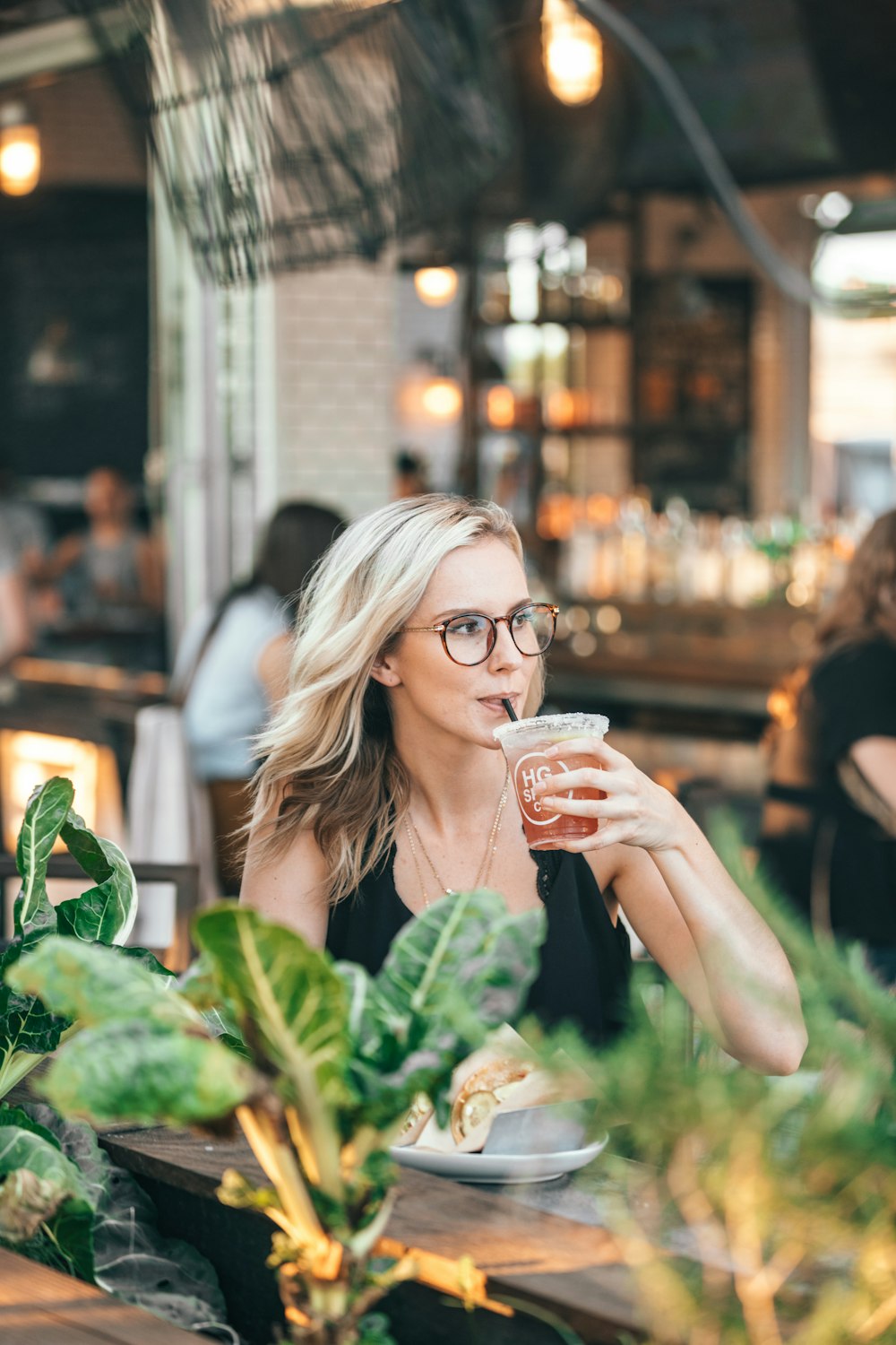 woman in black sleeveless top