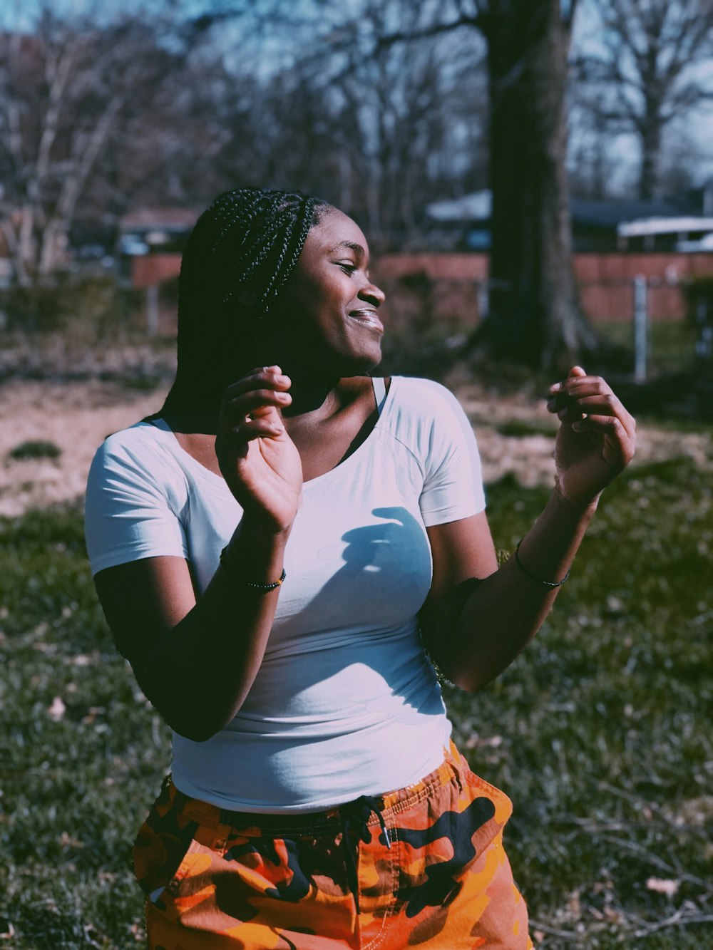 smiling woman wearing white shirt