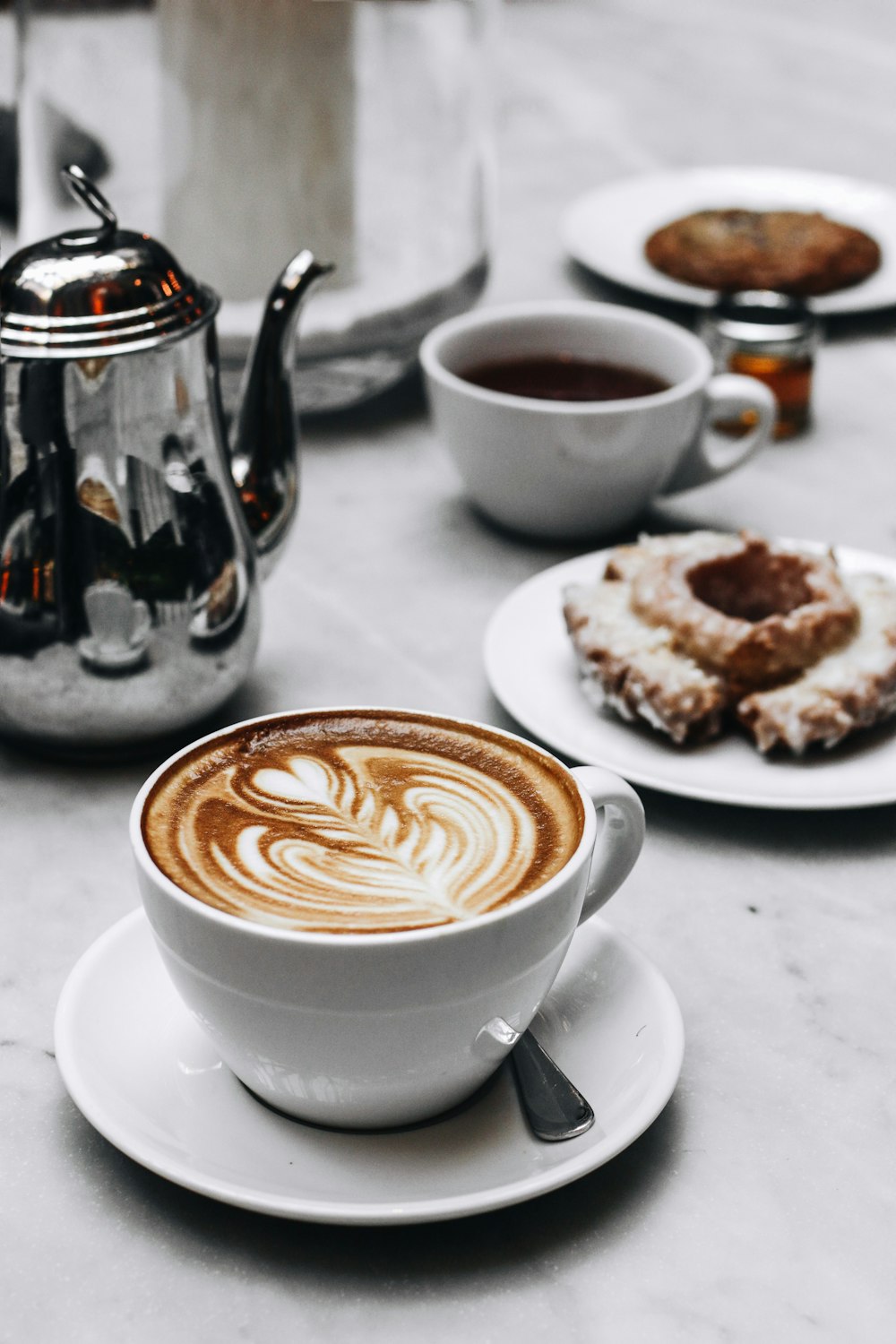 closeup photo of coffee latte in ceramic mug