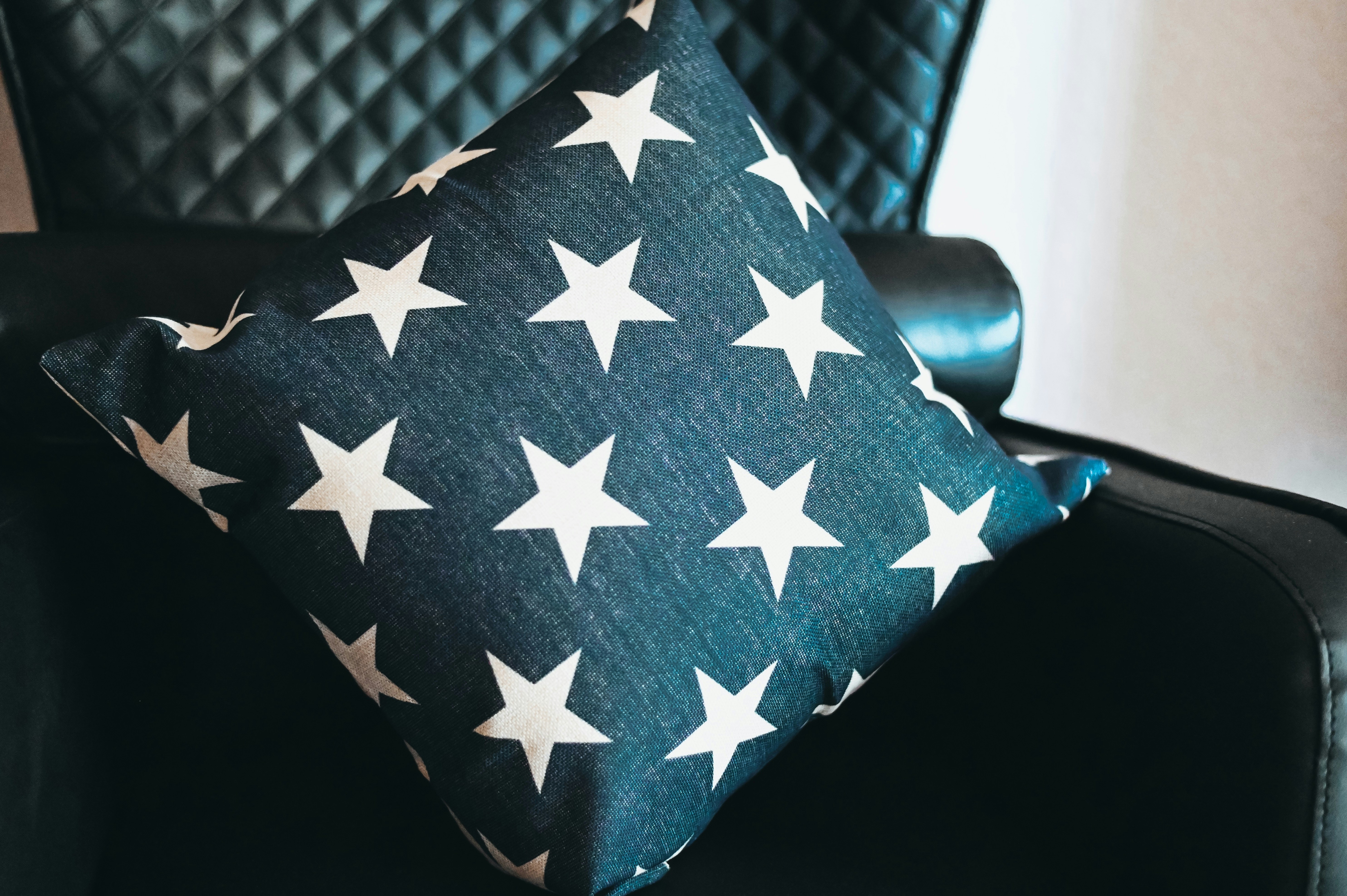 black and white star graphic throw pillow