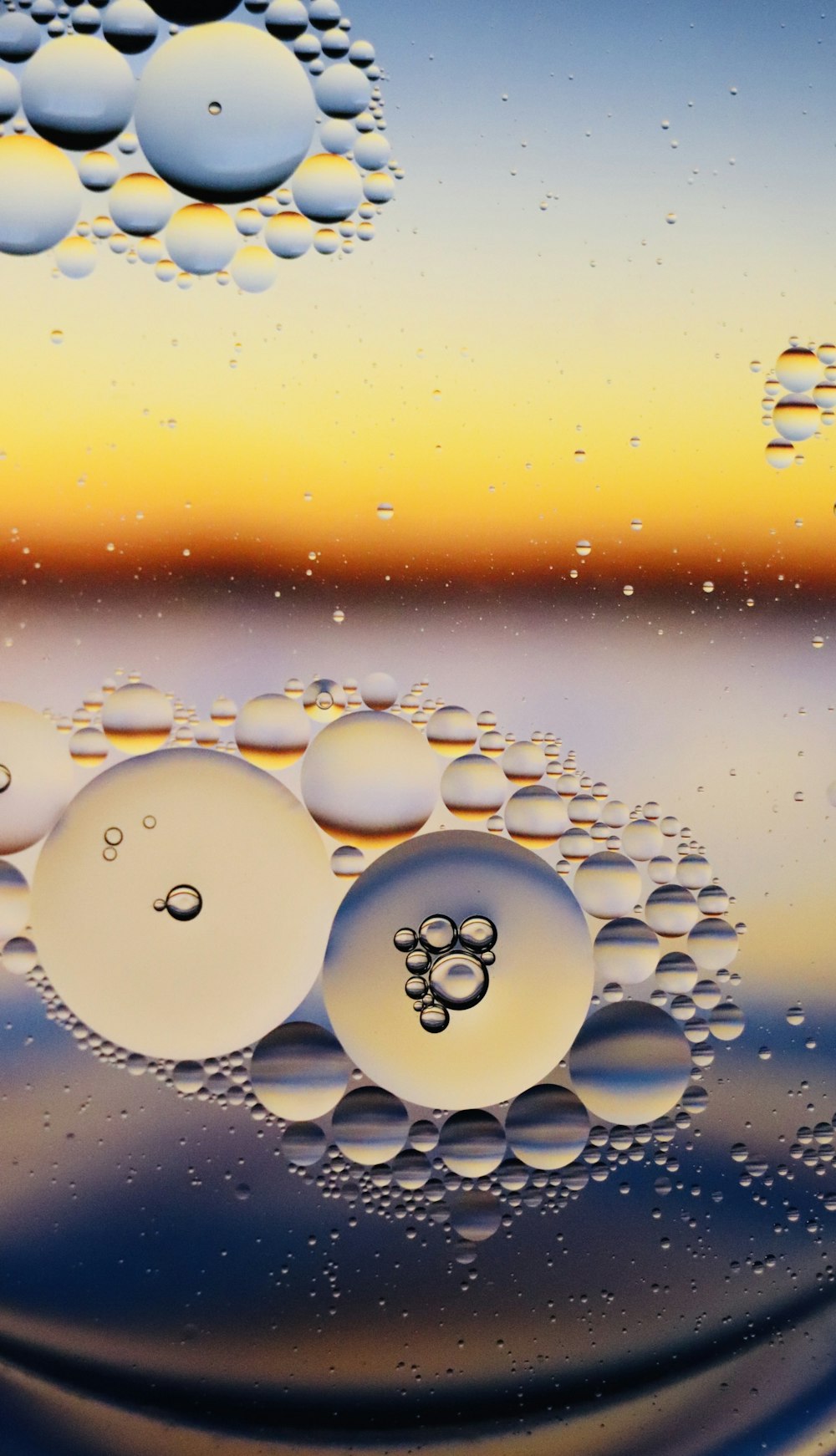 a close up of water bubbles on a surface