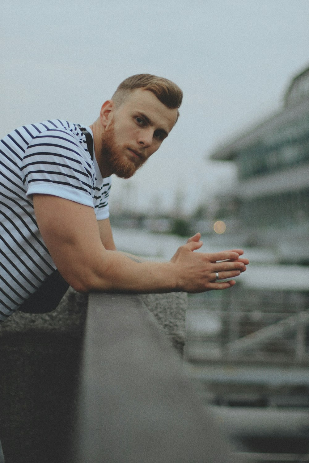 man in black and white striped top