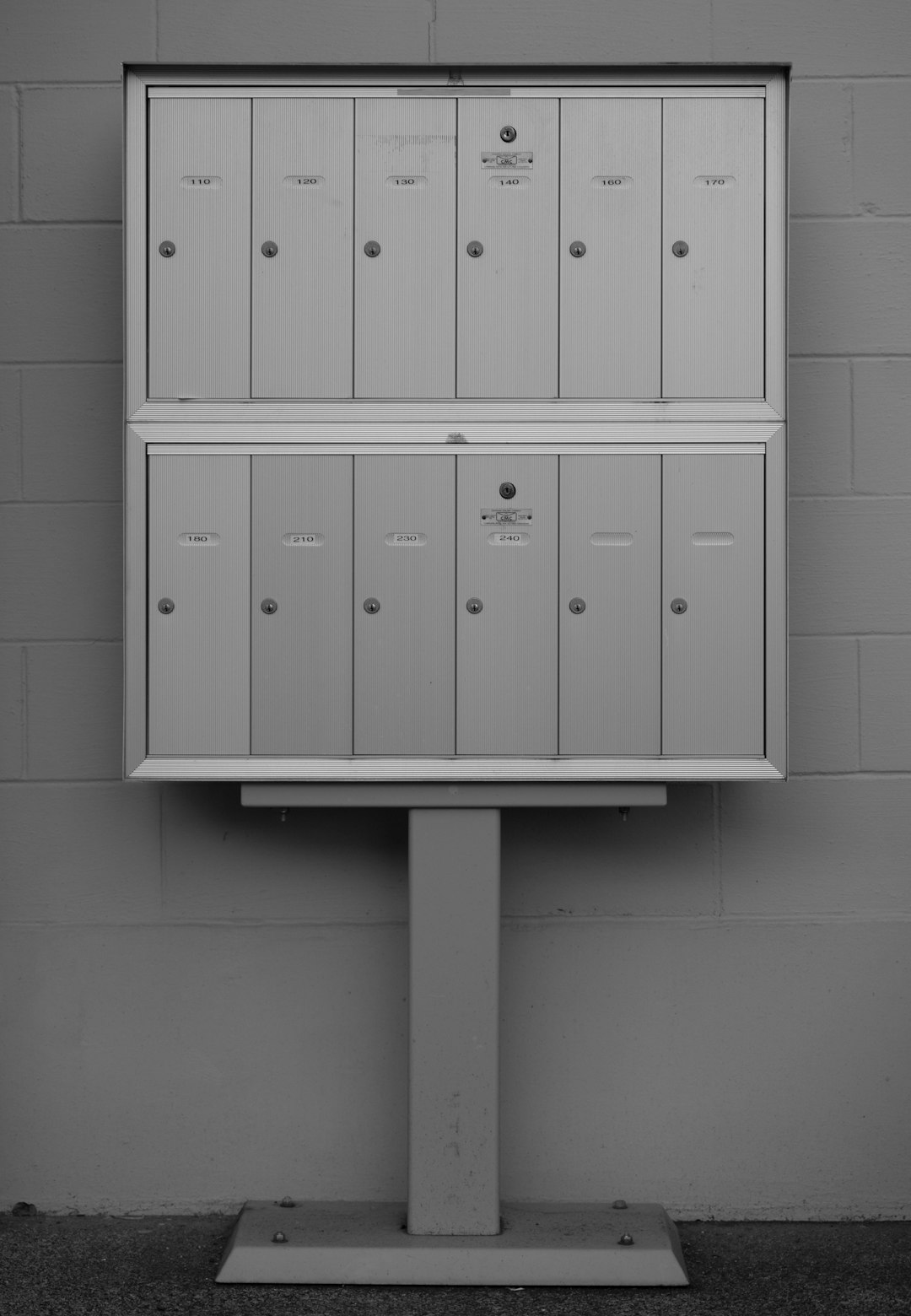 white and gray locker cabinet