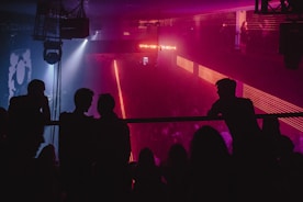 silhouette of people on stand