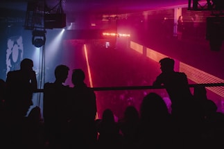 silhouette of people on stand