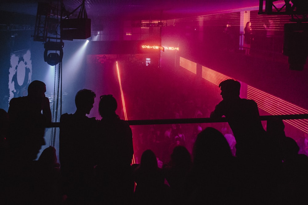 silhouette of people on stand