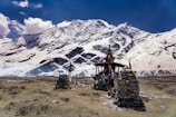 A serene image of a Tibetan temple surrounded by nature.