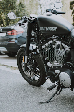 black Harley Davidson cruiser motorcycle