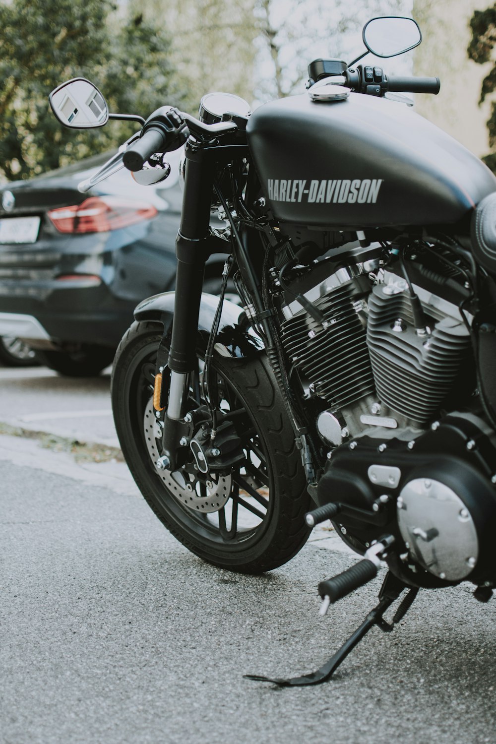black Harley Davidson cruiser motorcycle