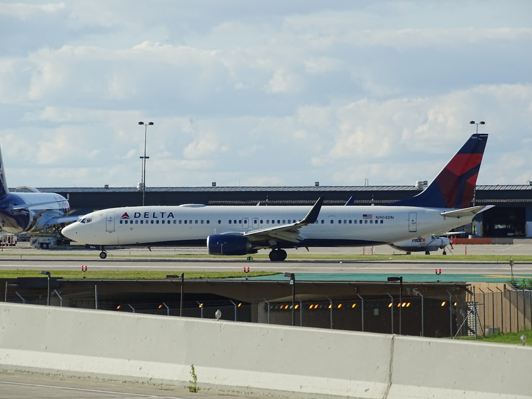 white Delta airplane,
