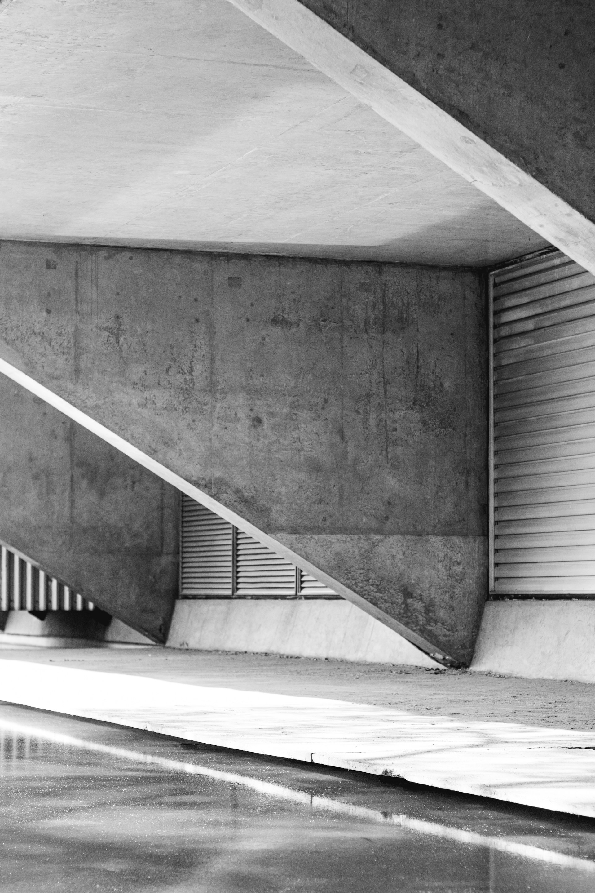 grayscale photo of concrete building