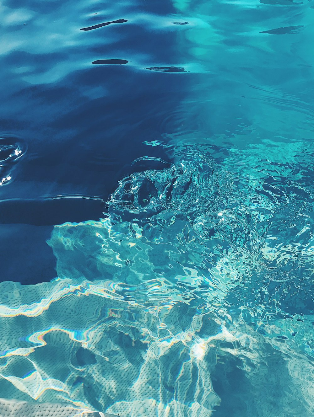 a view of the water from under the surface of the water