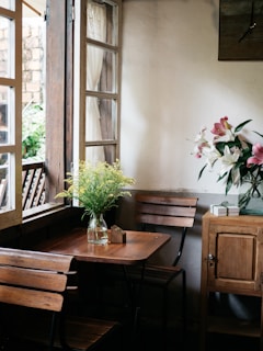 A quiet corner with fresh flowers and subtle luxury accents.