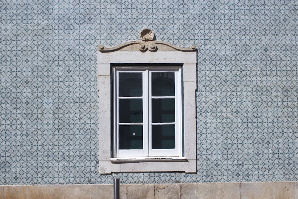 closed window on wall