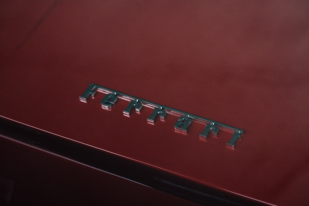 silver-colored Ferrari emblem