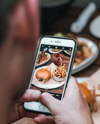 silver iPhone 6 with black case close-up photography