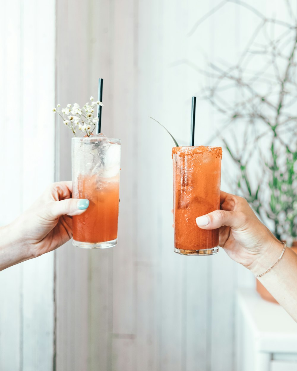 two filled drinking glasses