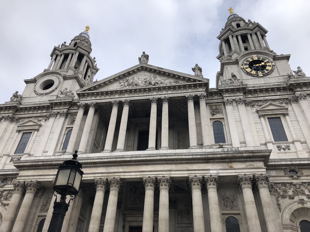 low angle photography of gray pillared cathedral