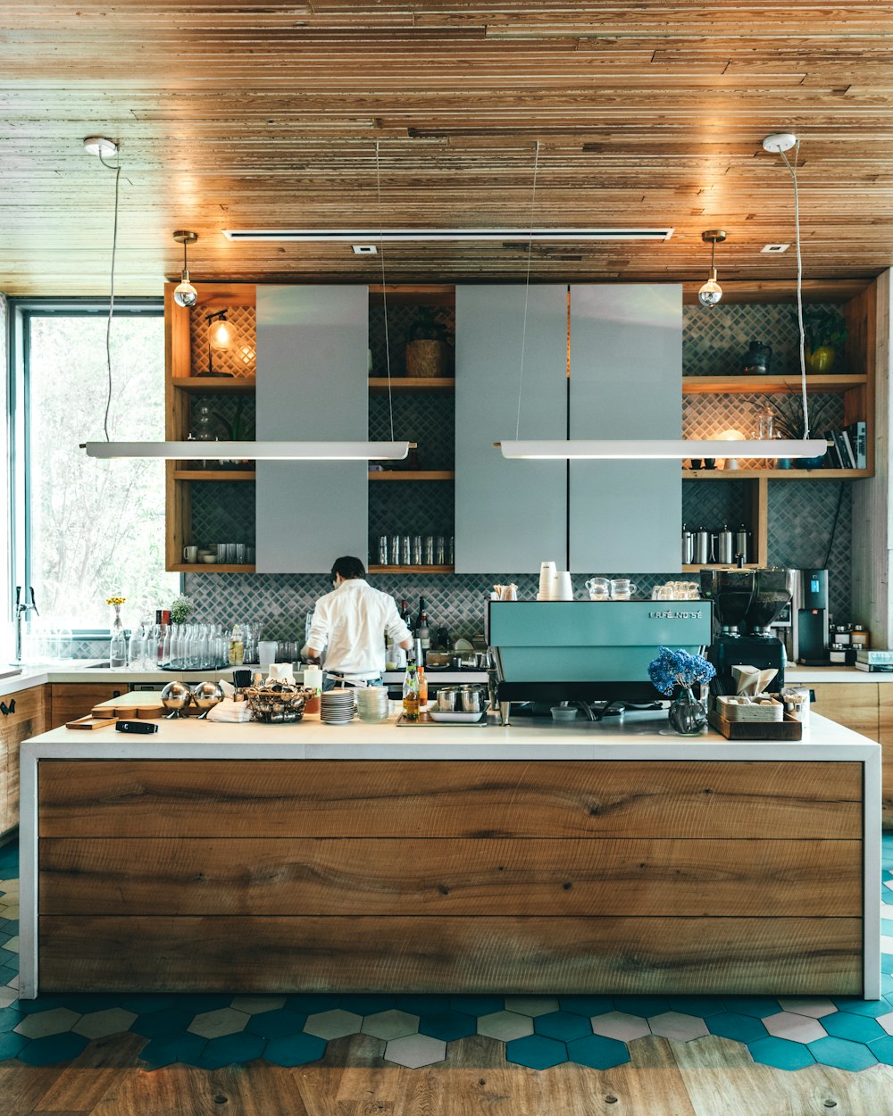 person standing in kitchen